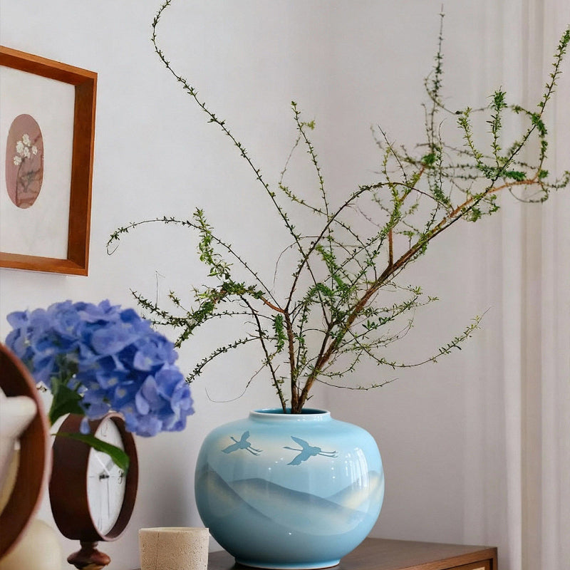 Modern Chinese Ceramic Vase with a Landscape Painting Motif Featuring a Blue Round Flower Vessel